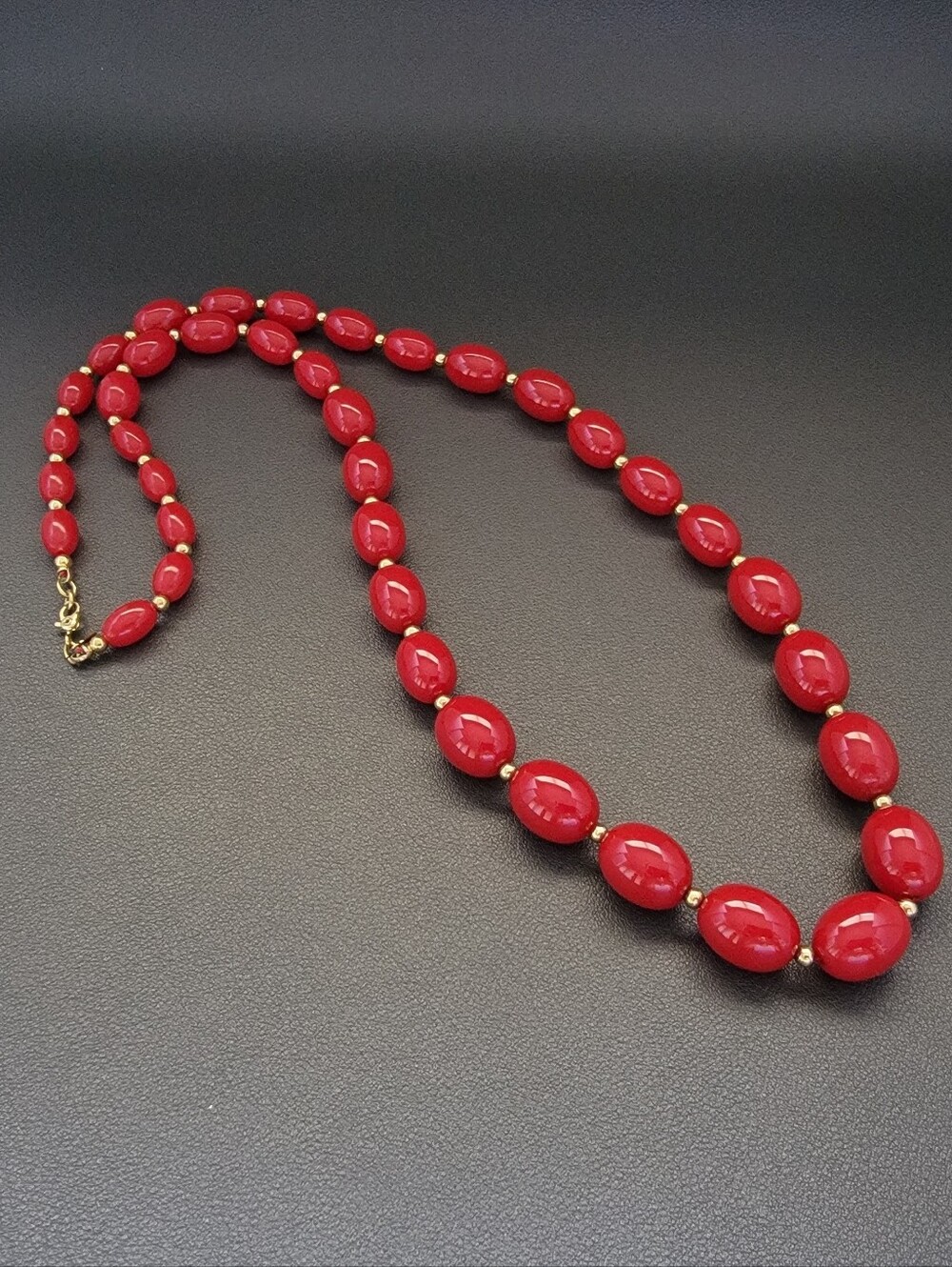 Vintage Monet Graduated Red Lucite Bead Necklace Gold Tone Oval Beads Classic